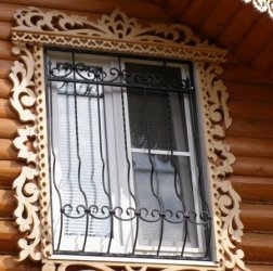 Красивые резные деревянные наличники на окна